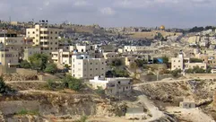 جبل المكبر مع قبة الصخرة في الخلفية.